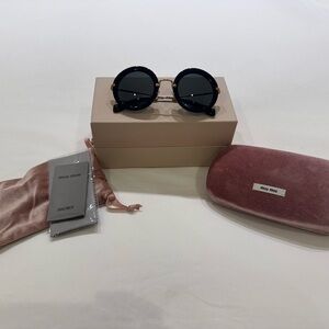 Miu miu sunglasses black and gold